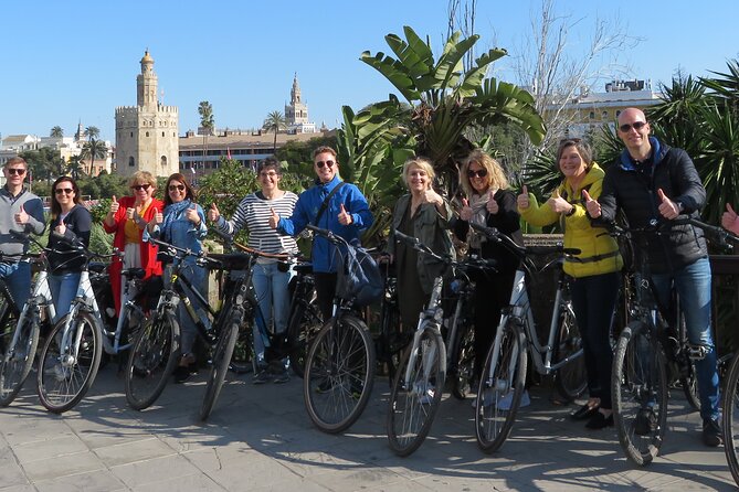 3-hour Guided Bike Tour along the Highlights of Seville - Triana: pottery lanes and flamenco legends on foot and by bike