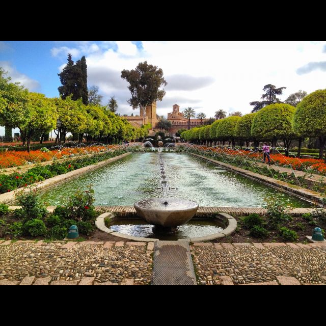 Alcazar of Cordoba Entry Ticket and Guided Tour - Patio Morisco and the baths: Moorish motifs, crenellated towers, and what to watch for