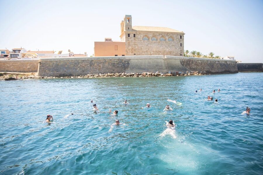 Alicante: 6-Hour Catamaran Cruise to Tabarca Island - Catamaran Comfort, Nets for Sun, and Onboard Crew Energy