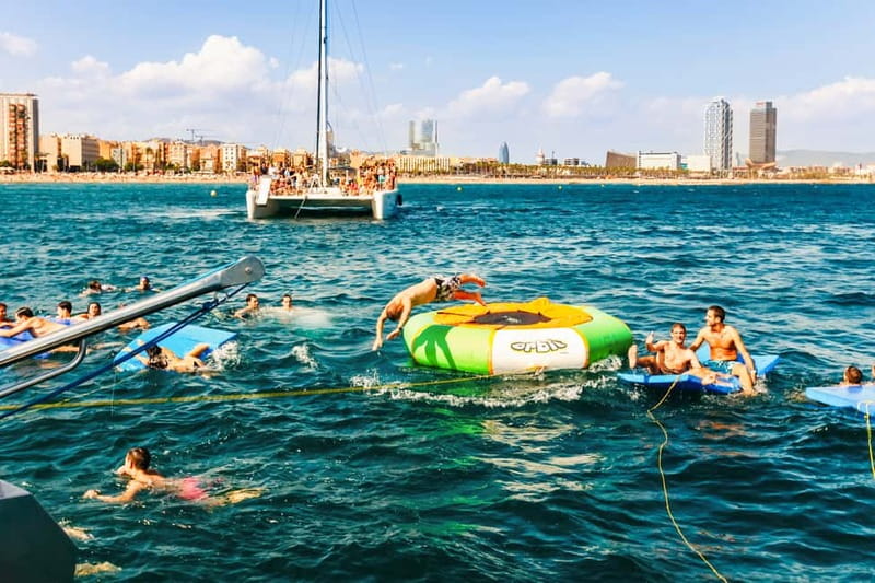 Barcelona: Catamaran Party Cruise with BBQ Meal - Getting on board: the Port Olímpic meeting point that can trip you up