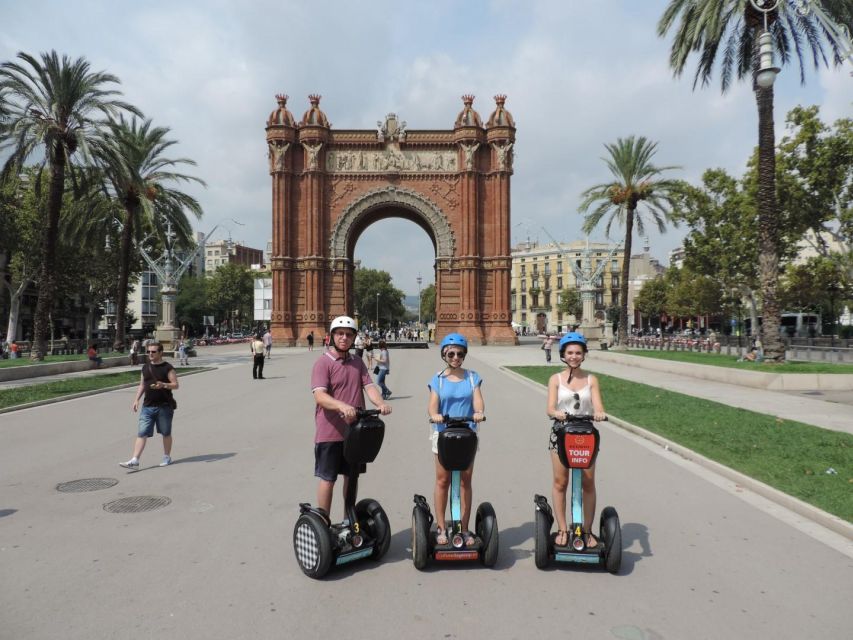 Barcelona: City Highlights Guided Segway Tour - Down toward Port Vell: yachts, promenade riding, and beach street life