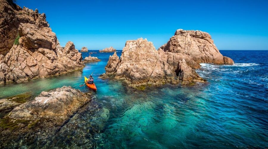 Barcelona: Costa Brava Kayak, Snorkel & Cliff Jump & Lunch - Cliff jumps in clear Mediterranean water: optional thrill with safety controls