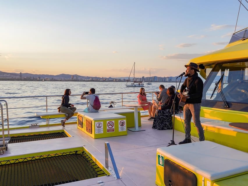 Barcelona: Daytime or Sunset Catamaran Cruise with Music - Onboard setup: bar, photo spots, and the Kids Corner