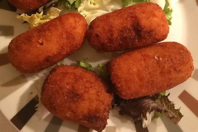 Barcelona Food Tour: Tapas, Drinks and Delights with a Local - Stop 4 at Plaça de Sant Josep Oriol: pintxos and weekend market energy