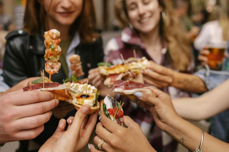 Barcelona: Food Walking Tour with Tapas and Wine - What you actually eat: 9 tapas tastings, with paella and dessert