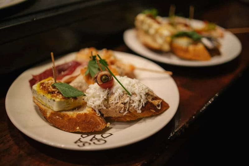 Barcelona: Food Walking Tour with Tapas and Wine - The cultural stops that turn food into context