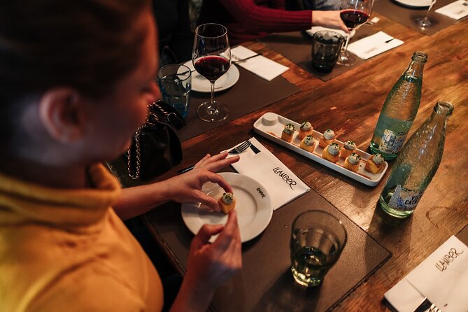 Barcelona: Guided Food Walking Tour with Tapas and Wine - Meeting Point: Pl. de Correus and the Yellow Carpe Diem Tours Flag