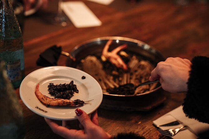 Barcelona: Guided Food Walking Tour with Tapas and Wine - Stop 3 on Carrer de la Mercè: Sailor-Style Bites and the Porrón Ritual