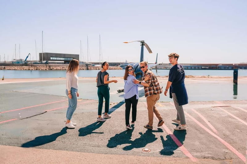 Barcelona: Helicopter, Boat Ride & Old Town Private Tour - Helipuerto del Puerto de Barcelona: your 6-minute helicopter flight from the Port