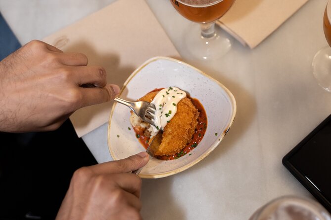 Barcelona Old Town Tapas Tour: Vermouth, Bites & Hidden Gems - Placa Sant Felip Neri and Pont del Bisbe: Quiet Beauty With a Story