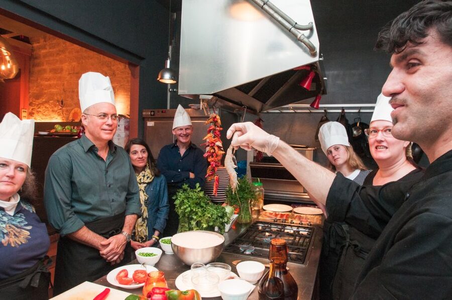 Barcelona: Paella Cooking Experience & Boqueria Market Tour - The paella moment: standing around the paellera and doing real work