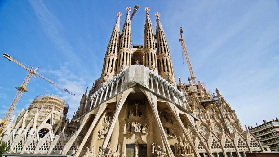 Barcelona & Sagrada Familia Half-Day Tour with Hotel Pickup - Starting with La Rambla and the Gothic Quarter, where the city layers show