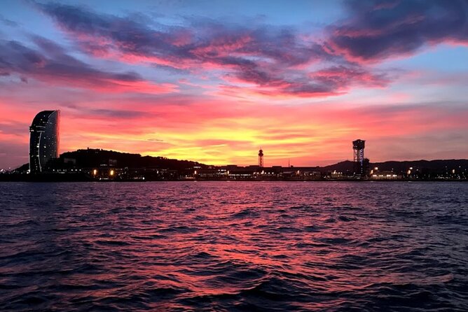 Barcelona Sensational Sunset Tour with Open Bar and Snacks - Stop 3: Port Vell, the Old Harbor, and the waterfront that never feels finished