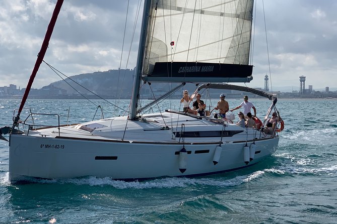 Barcelona Small Group Sailing with Snacks and Cava - Captains set the tone: David, Fiona, Marcos, and Alessio
