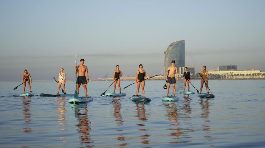 Barcelona: Sunrise Paddleboarding with Instructor and Photos - Before You Go: What to Bring for a Smooth, Dry-Enough Morning