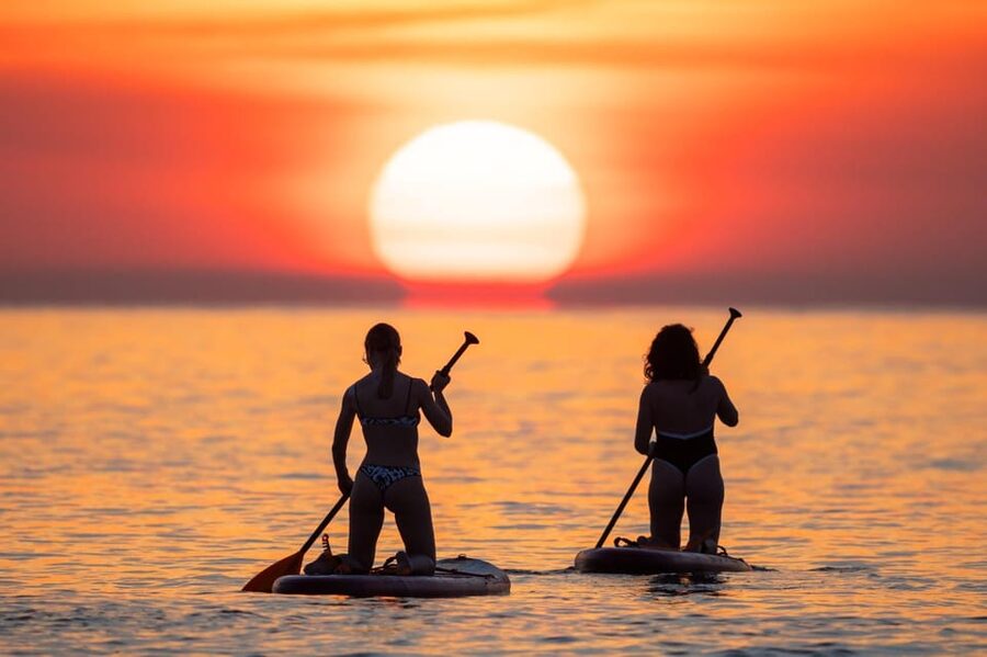 Barcelona: Sunrise Paddleboarding with Instructor and Photos - Paddling Out for Sunrise: 1.5 Hours That Turn into Your Best Morning Photo