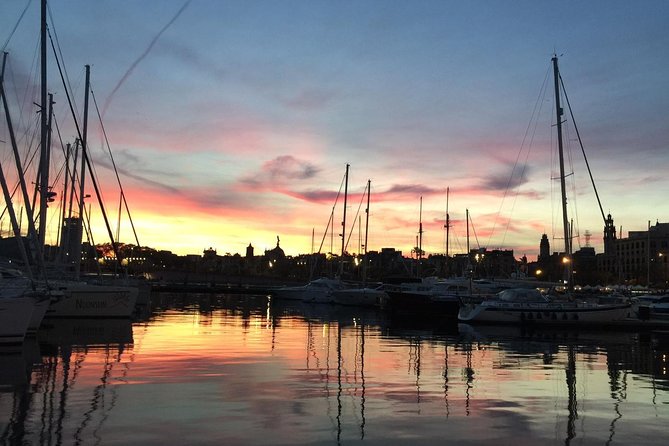 Barcelona Sunset Cruise with Light Snacks and Open Bar - A Tiny Sailboat Sunset From Port Vell