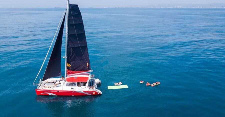 Barcelona: Sunset or Day Catamaran Cruise with Tapa & Drink - The welcome: tapa and a free drink that actually starts the vibe