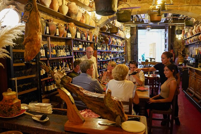 Barcelona Tapas and Wine Experience Small-Group Walking Tour - Passeig del Colom to El Born: medieval streets with modern energy
