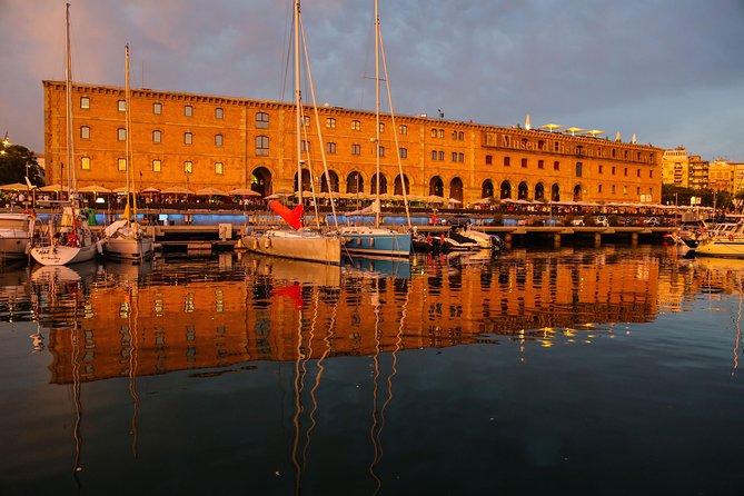 Barcelona Unique Sunset Sailing Experience with Tapas & Open Bar - Tapas, open bar, and how much food you get