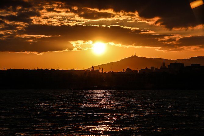 Barcelona Unique Sunset Sailing Experience with Tapas & Open Bar - Live musician upgrade: sax or guitar for the right kind of evening