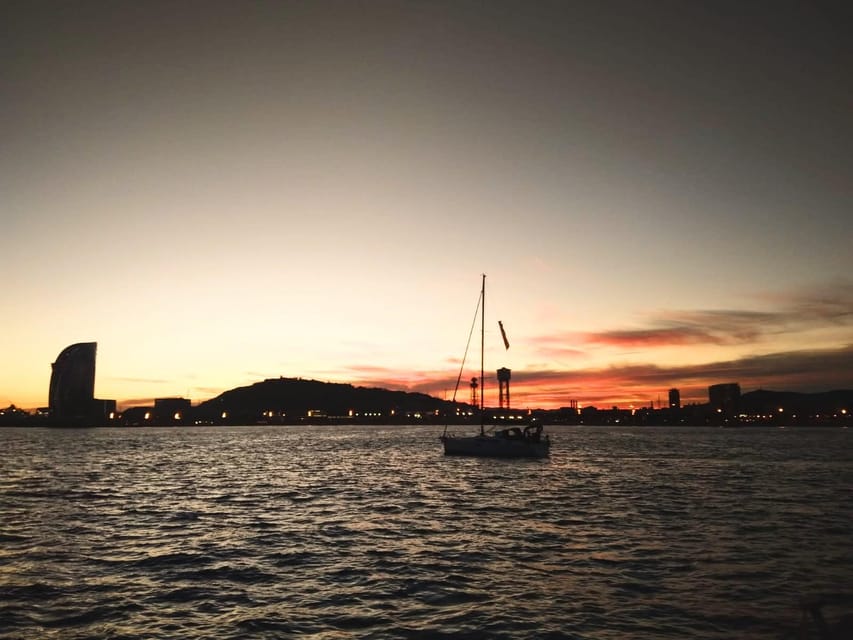 Barcelona: Unique Sunset Sailing Tour with Tapas & Open Bar - Quick Hit Highlights