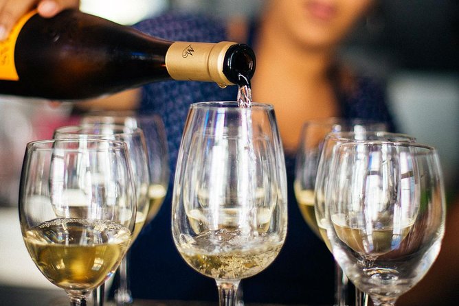Barcelona With Locals: Wine and Tapas Private Tour - Wine tasting lessons you can actually use next week