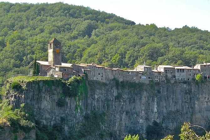 Besalu & 3 Medieval Towns Small Group Tour with Hotel Pick-Up - Besalú: walls, medieval bridge views, Jewish history, and hilltop castle outlooks