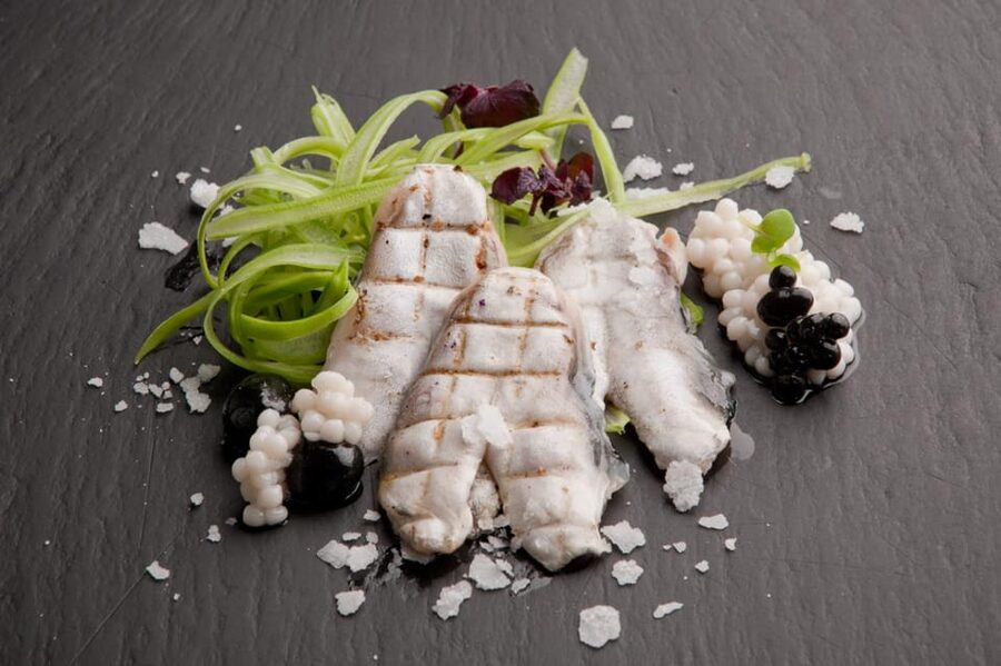 Bilbao: Guggenheim Secrets & Savor the Sea’s Treasures. VIP - Surf-and-turf Basque meal, what’s included and why it pairs well