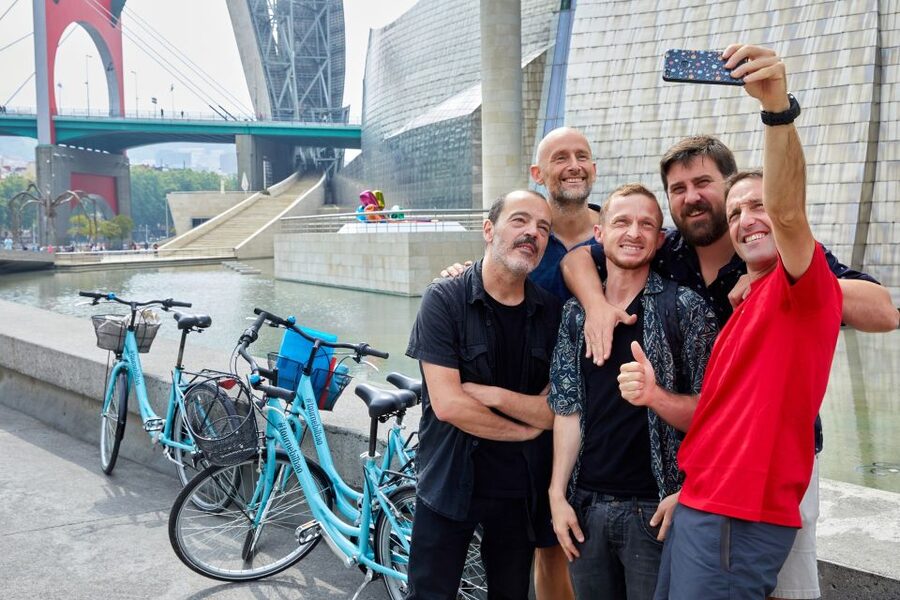 Bilbao: Guided Highlights Small Group or Private E-Bike Tour - Maritime Museum and shipbuilding ties to the river