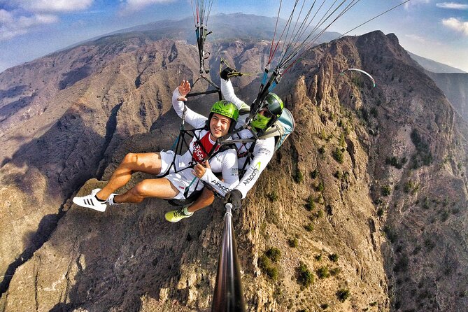 BRONZE tandem paragliding flight in South Tenerife, free pick up - Why this Bronze tandem flight can be good value at $133.08