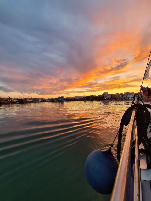 Cambrils: Costa Dorada Sunset Catamaran Cruise with Drinks - Drinks on Board: Open Bar Value and What to Expect