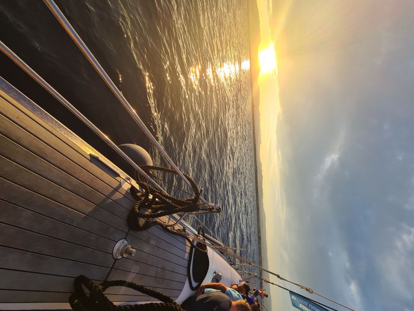 Cambrils: Costa Dorada Sunset Catamaran Cruise with Drinks - Sunset From the Deck: Clouds, Full Moon, and the Real Deal