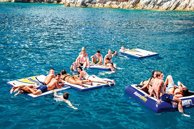 Catamaran ride -Costa Brava with barbecue and drinks. Familiar. - Lloret de Mar to Tossa by Catamaran, With a Coasting-By View Route