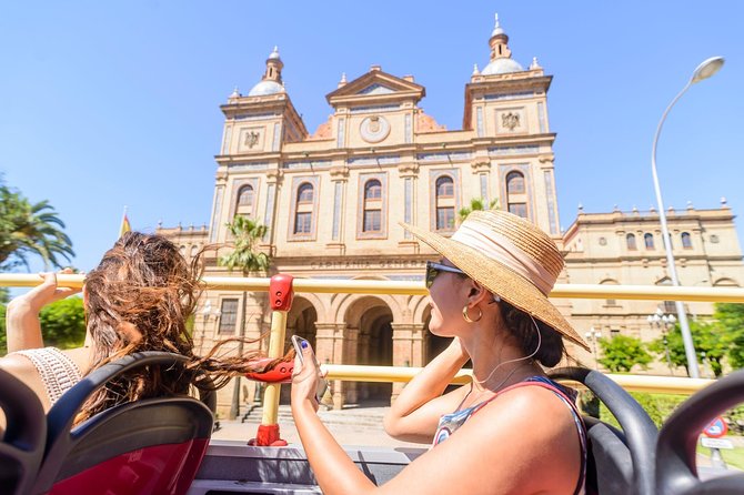 City Sightseeing Seville Hop-On Hop-Off Bus Tour - What else is included: churches, paella tasting, museums, and discounts