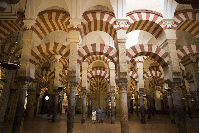 Cordoba Guided Tour Mosque and Cathedral from Seville - La Judería walk: streets, atmosphere, and smart free time