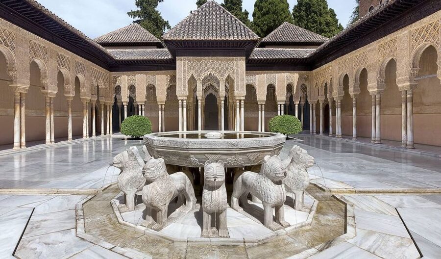From Costa del Sol: Granada, Alhambra + Nasrid Palaces Tour - Entering the Alhambra story: Charles V, Nasrid palaces, and the famous courtyard