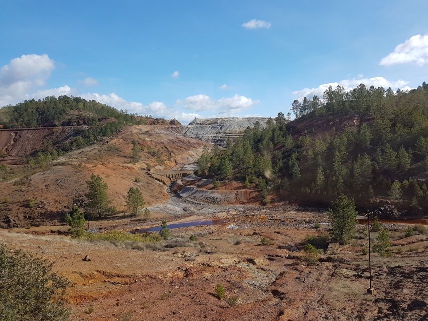 From Seville: Full-Day Aracena & Rio Tinto Mines Tour - Gruta de las Maravillas: 2,000 meters of stalactites and blue water