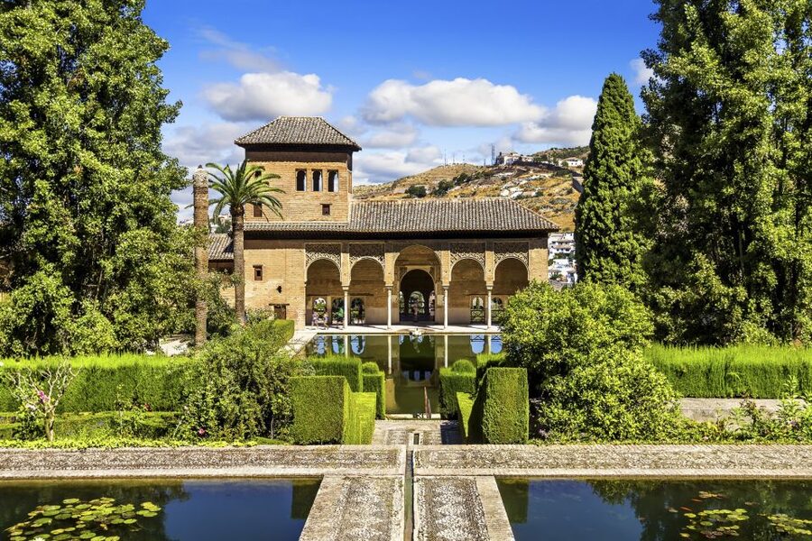 Granada: Alhambra Small Group Tour with Nasrid Palaces - Palace of Carlos V: The Christian Contrast in 15 Minutes