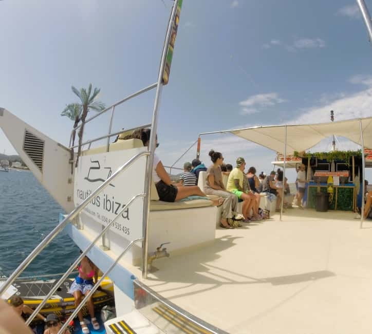 Ibiza: Es Vedrà Boat Tour with Swimming Stop - Photo-friendly timing: glass-bottom windows and a sunset tease back in San Antonio