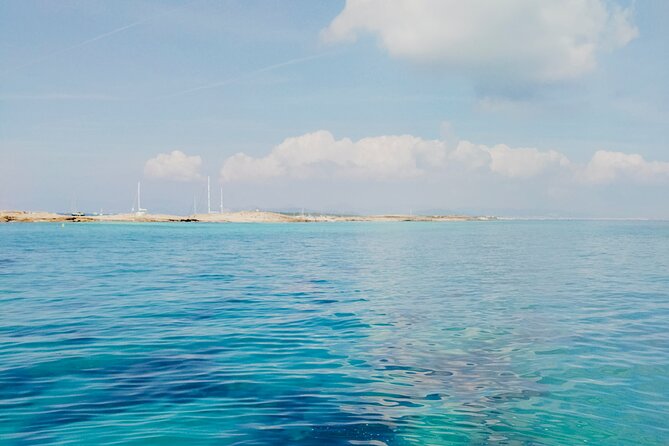 Ibiza & Formentera Private Full-Day Sailing Tour - The return sail back to Cala Jondal: relaxing, photos, and hands-on fun