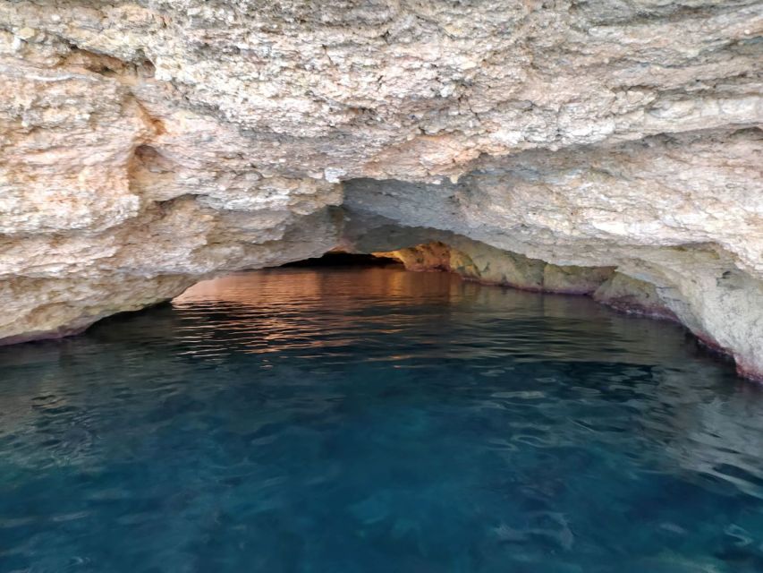 Ibiza: Snorkeling and SUP Paddle, Beach and Cave Tour - Cala Bassa snorkeling and SUP: rocky edges, sandy calm, and safe viewing