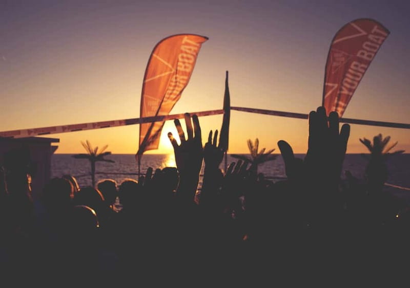 Ibiza: Sunset Boat Party Cruise with DJs with 2 Clubs - Entering the experience: San Antonio harbour meeting point and wristband reality