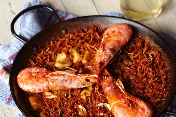 Interactive Paella & Market: Bottomless Wine & Rambla Views - Cooking Station Mode: Tortilla, Tomato Bread, and Strawberry Gazpacho