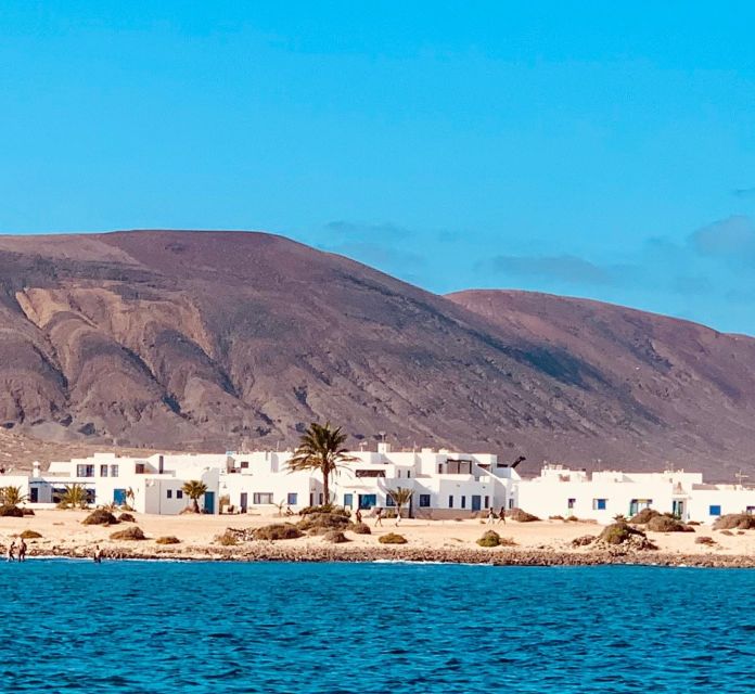 Lanzarote: Return Ferry to La Graciosa with Bus Pickup - Ferry ride: short crossing, real sea reality