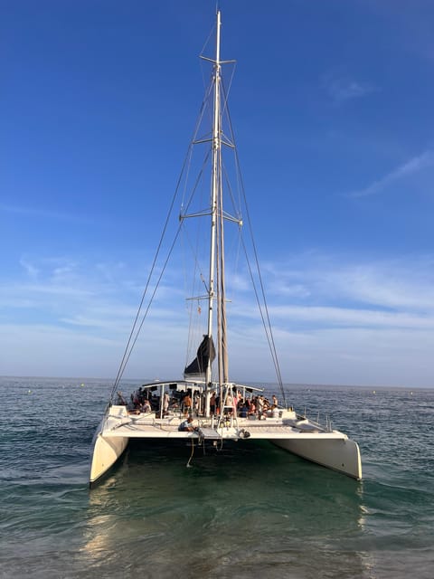 Lloret de Mar: Sunset Catamaran Cruise with DJ and Drinks - Why a Lloret de Mar sunset cruise hits different
