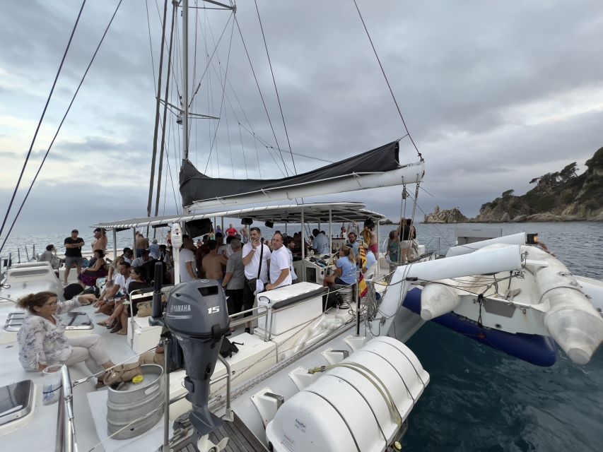 Lloret de Mar: Sunset Catamaran Cruise with DJ and Drinks - The swim stop in a calm inlet (and how to enjoy it)