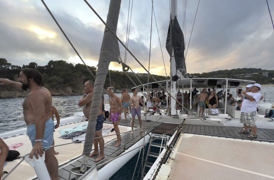 Lloret de Mar: Sunset Catamaran Cruise with DJ and Drinks - What to pack for a smooth, sandy-free sunset