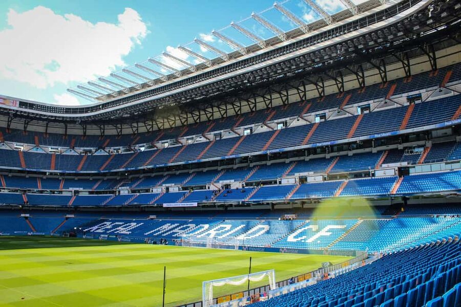 Madrid: Bernabéu Stadium Guided Tour With Megafan Upgrade - Entering VIP Areas: Benches, Changing Rooms, and Player-World Atmosphere
