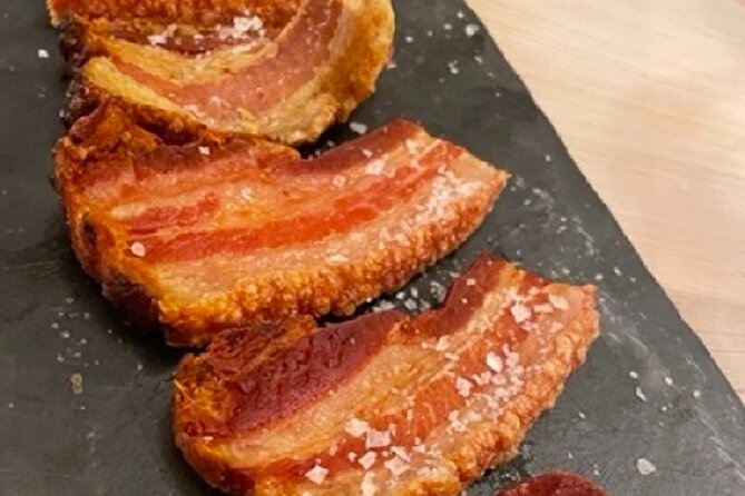 Madrid by Night Small Group Tour: Stories, Sights and Tapas Bites - The First Bar Includes the Momentum: Your Drink and 3 Tastings